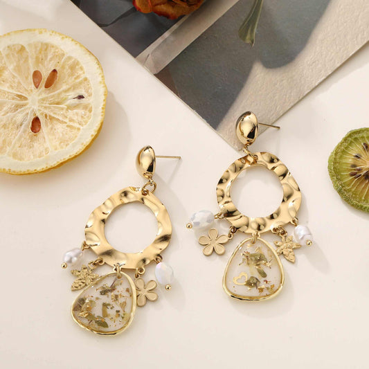 Boucle d'oreille fleur séchée - L'Armoire d'Ambre