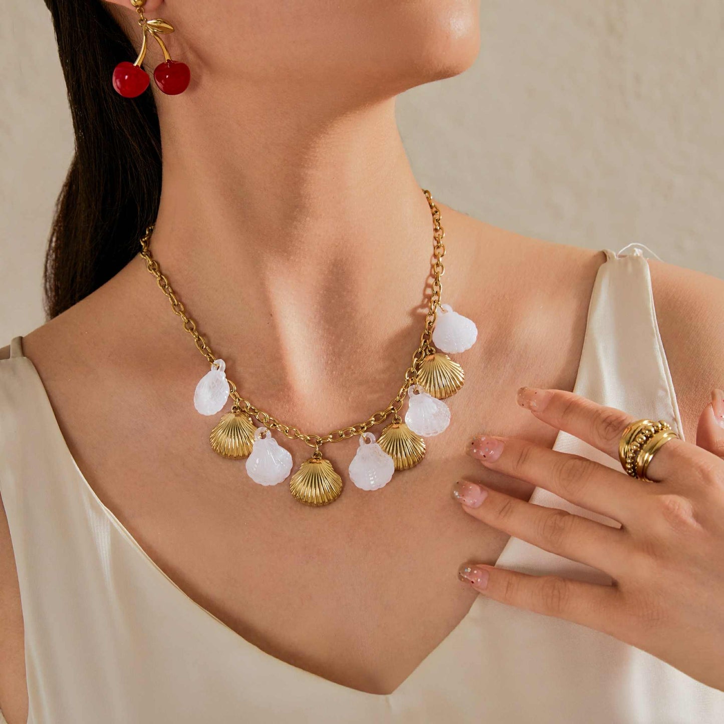 Collier breloques coquillages