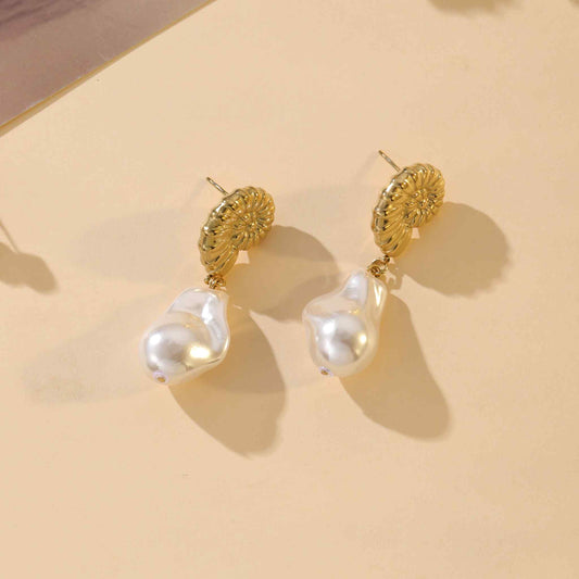 Boucle d'oreille escargot - L'Armoire d'Ambre