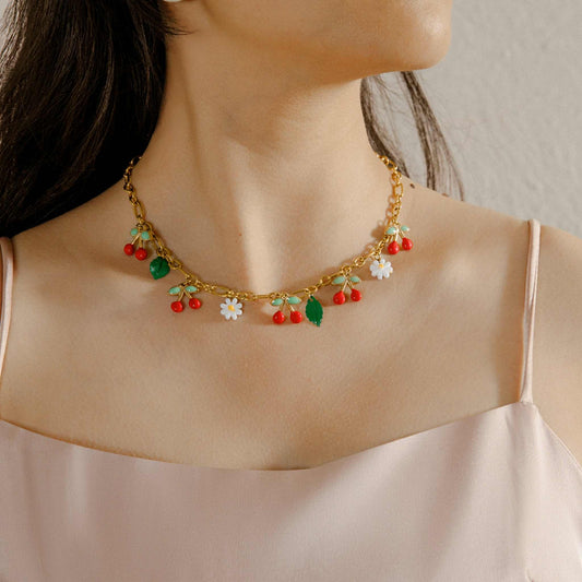 Collier breloques cerise/fleur